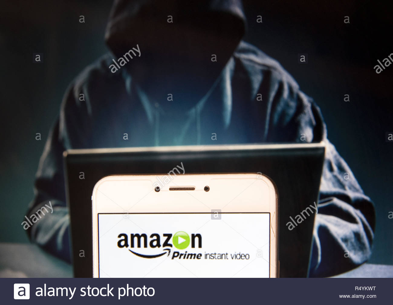 hong kong china 22nd nov 2018 american internet video on demand service owned by pany prime logo is seen on an android mobile device with a figure of hacker in the background credit miguel candelasopa imageszuma wirealamy live news R4YKWT