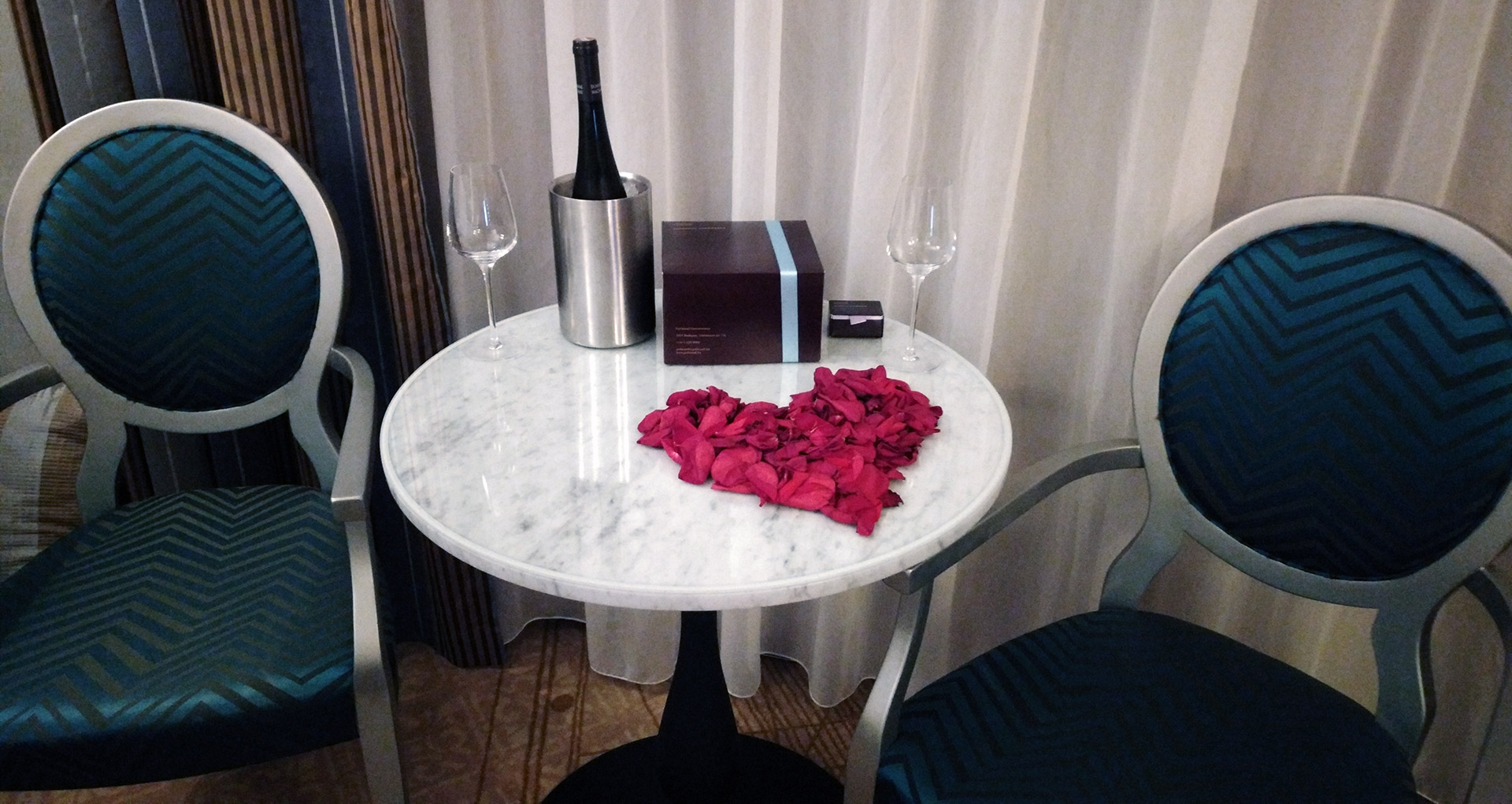 hotel aria budapest room table with chilled riesling wine