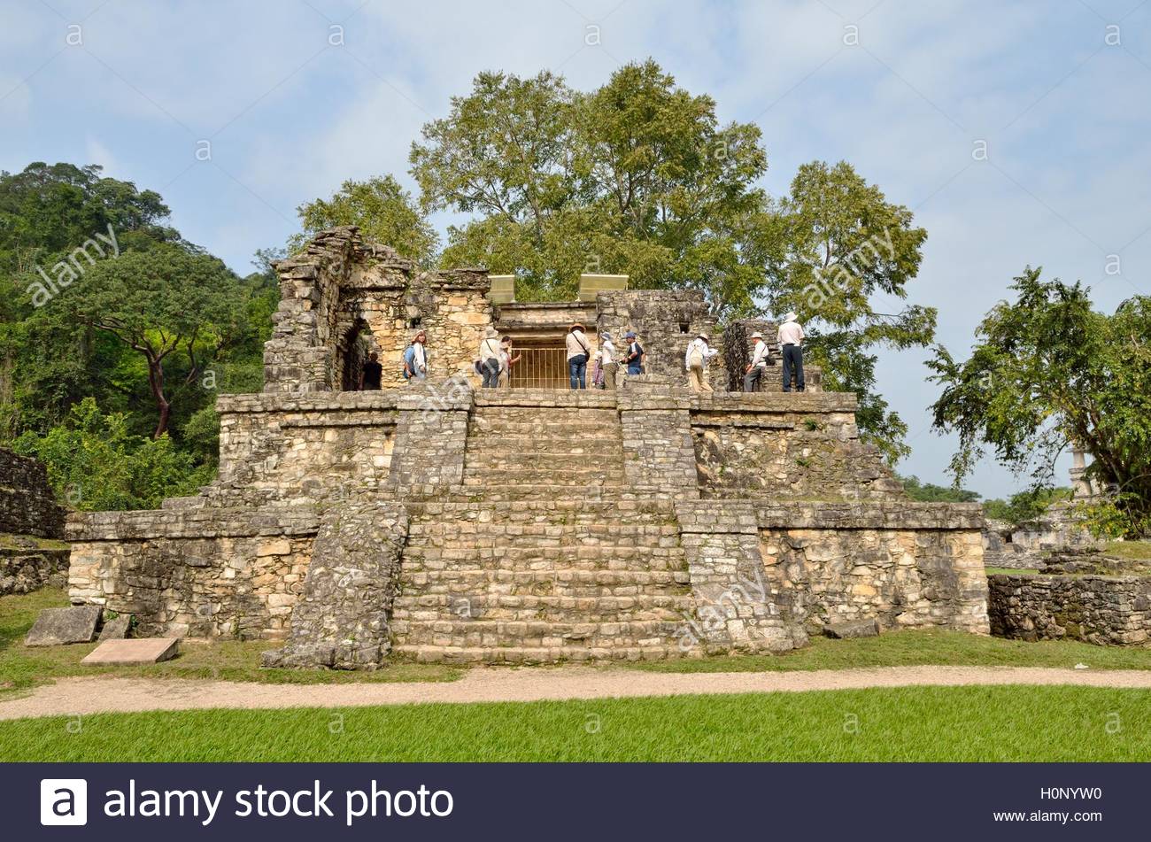 tourist group on templo xiv mayan ruins of palenque chiapas mexico H0NYW0