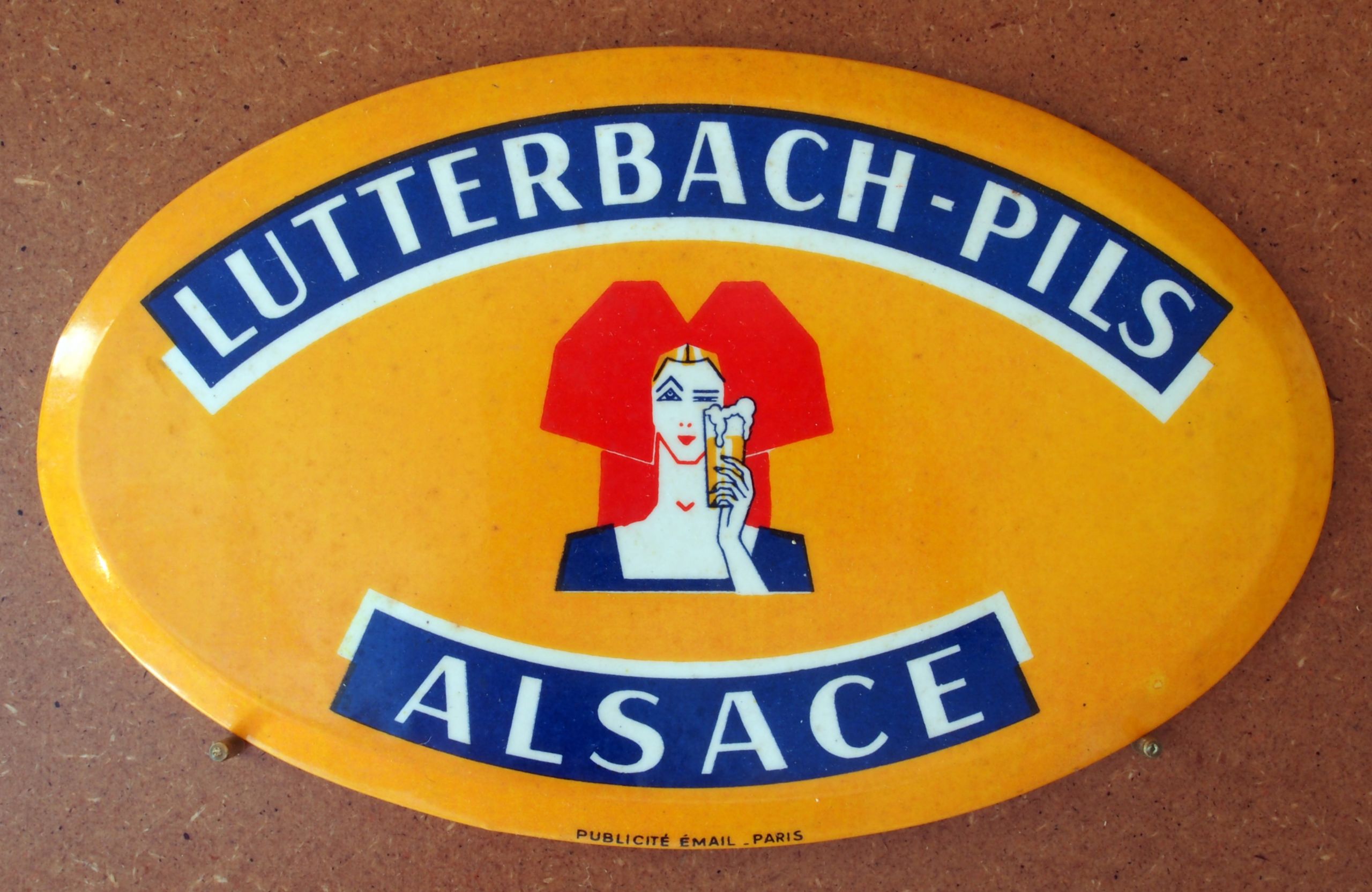 Lutterbach Pils Alsace enamel advertising sign at the Musée Européen de la Bière JPG