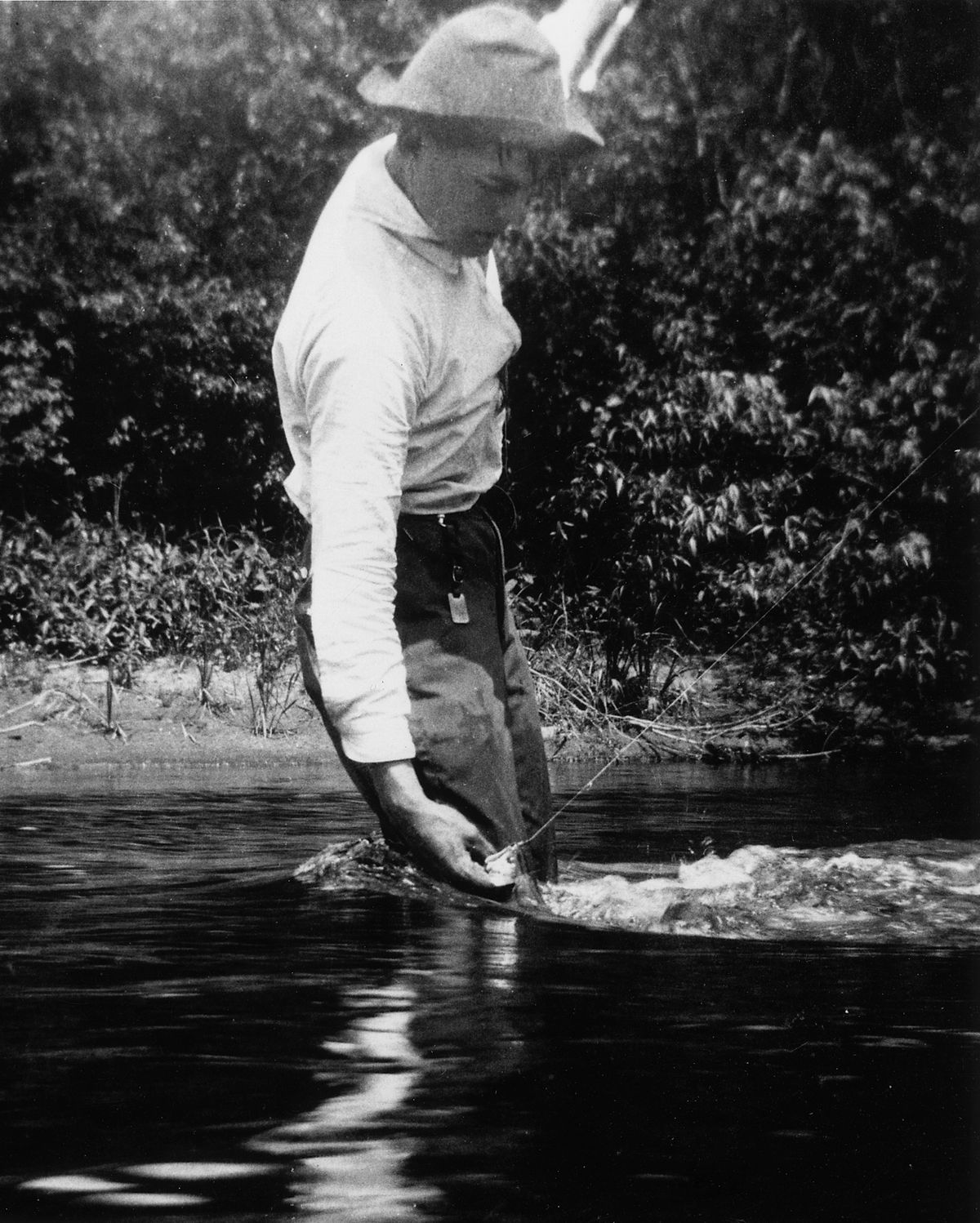 1200px Ernest Hemingway Fishing at Walloon Lake Michigan 1916