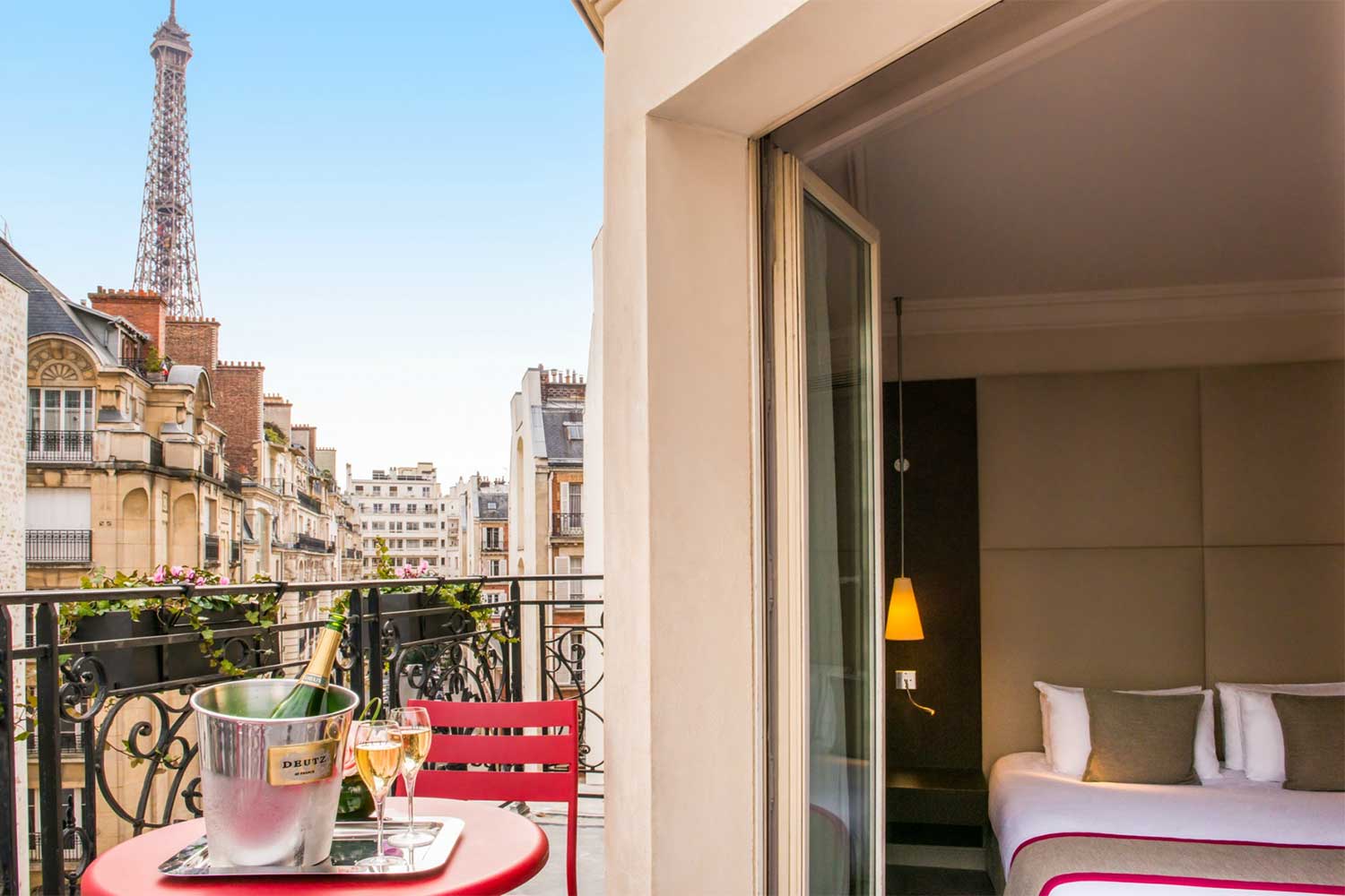 paris hotel with balcony view of eiffel tower