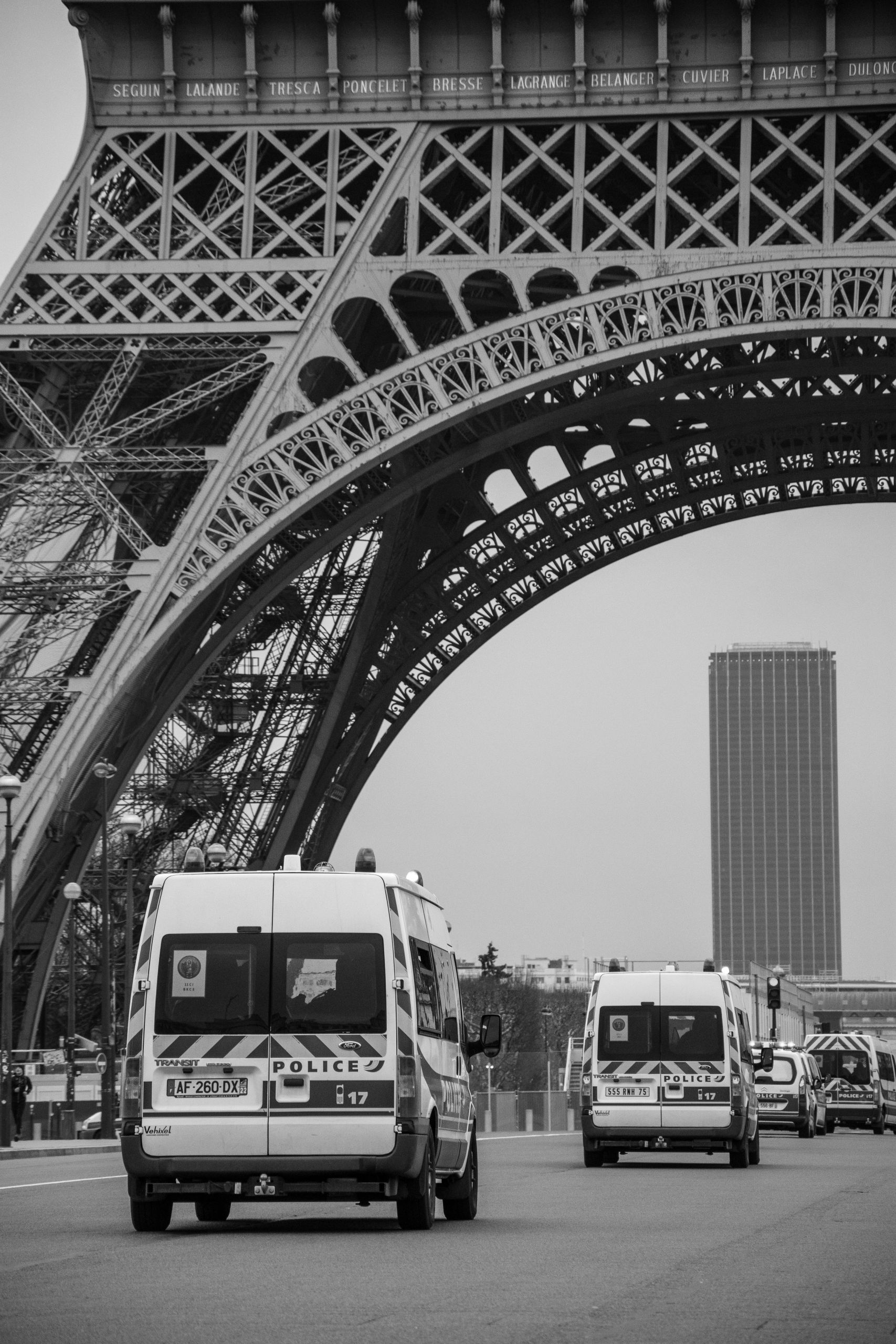 Jardin Du Kohistan Élégant Police Cars Moving Under Eiffel tower Paris During Day
