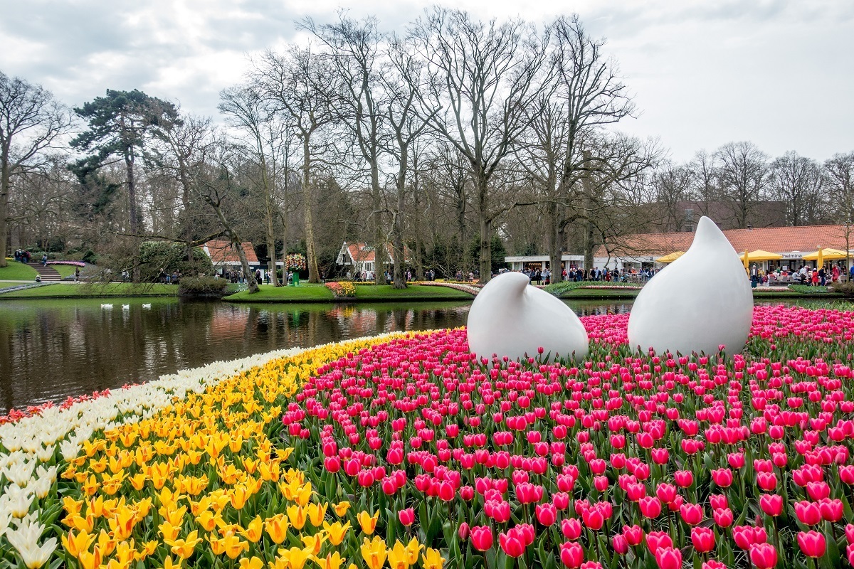 Keukenhof gardens Netherlands tulips and sculpture pond