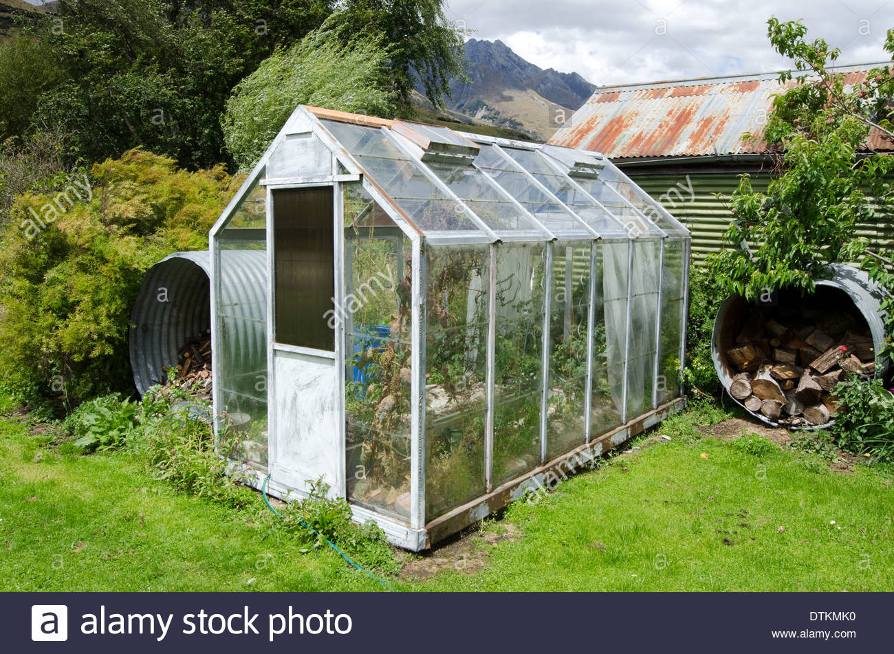 greenhouse in the garden on sunny day DTKMK0