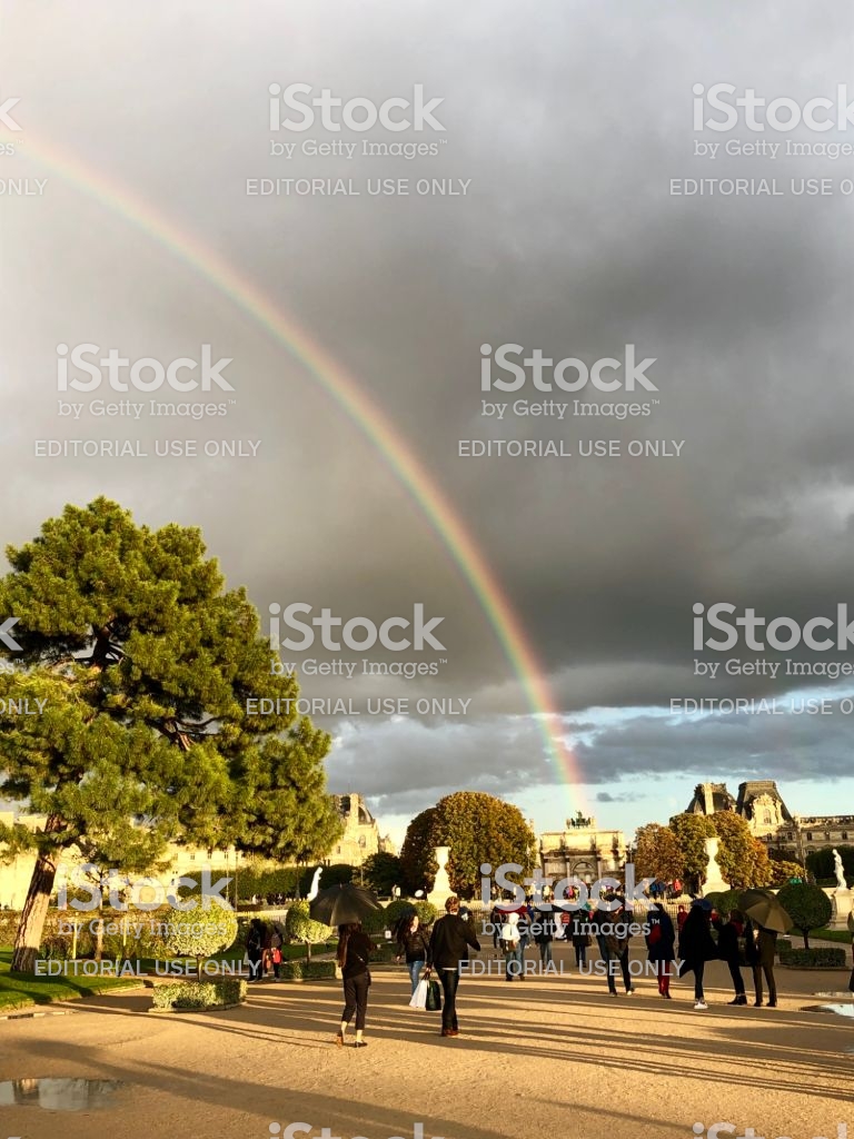 rainbow on arc de triomphe du carrousel near louvre in paris france gm