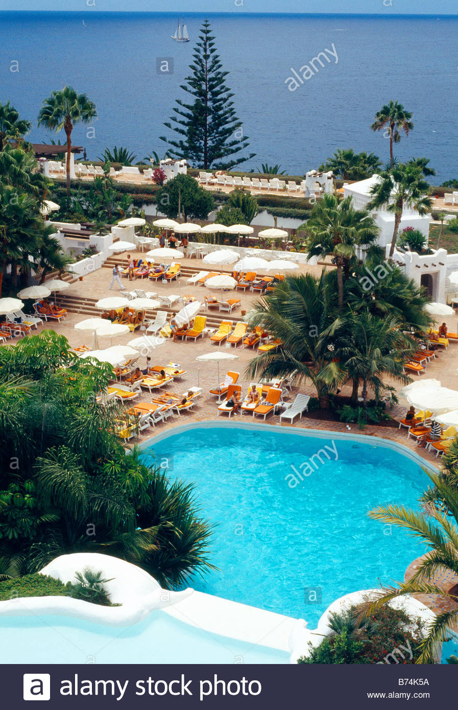 swimming pool in luxury hotel adeje tenerife island canary islands B74K5A